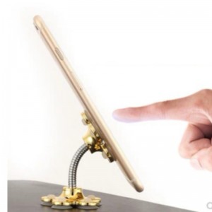 Auto creatieve mobiele telefoon navigatiebeugel nieuwe desktop magic sucker mobiele telefoon beugel schud geluid snel de hand