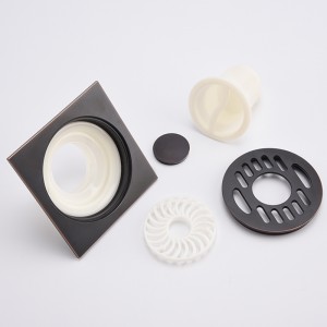 Zwarte patroon wasmachine zeef douche antieke afvoer stop