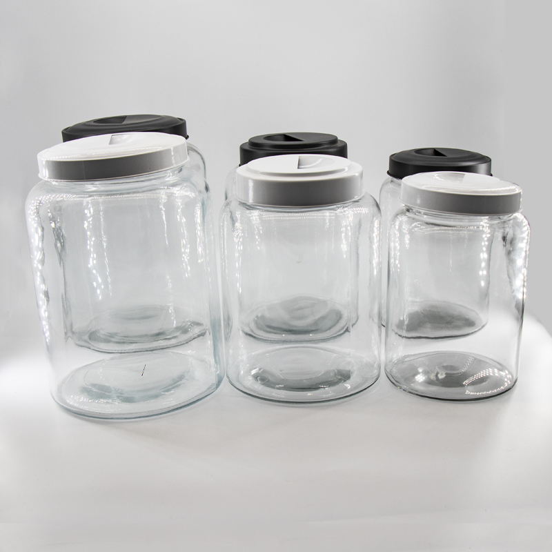 Groothandel glas voedsel opslag canners potten instellen met metalen deksels voor de keuken