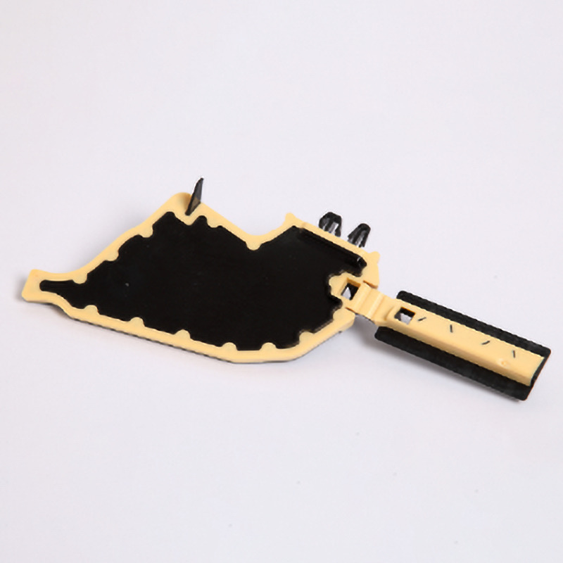 Tweekleurig kunststof onderdeel